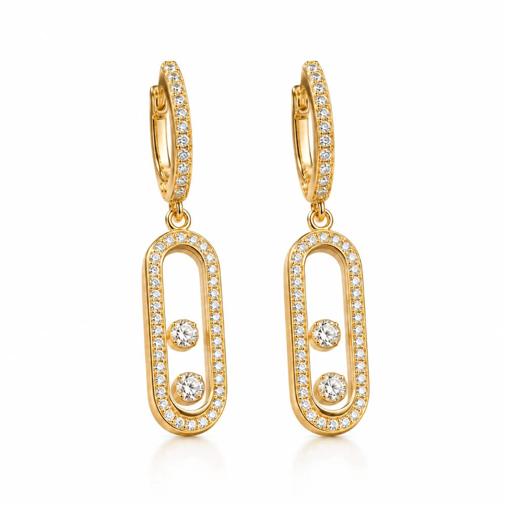 The Floating Link Drops — Sepasang · 2 berlian 0,05 ct bergerak per sisi · Pavé 40 × 0,01 ct per sisi · Panjang 32 mm · Emas 18K